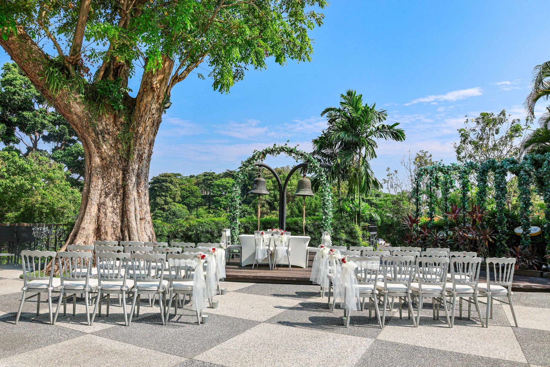 Arbora garden wedding solemnisation set up with angsana trees and Poland's Bells of Happiness