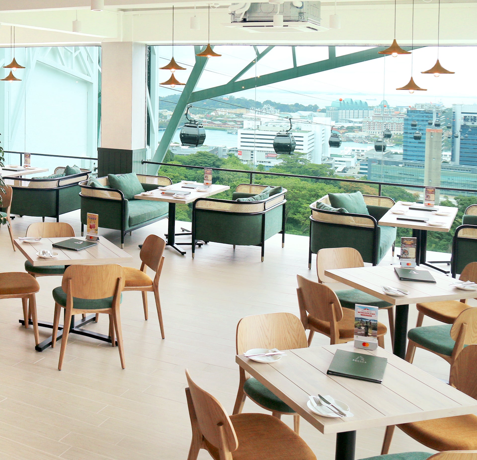 Arbora Cafe Mount Faber Peak indoor seating area facing the view of the cable cars and the harbour